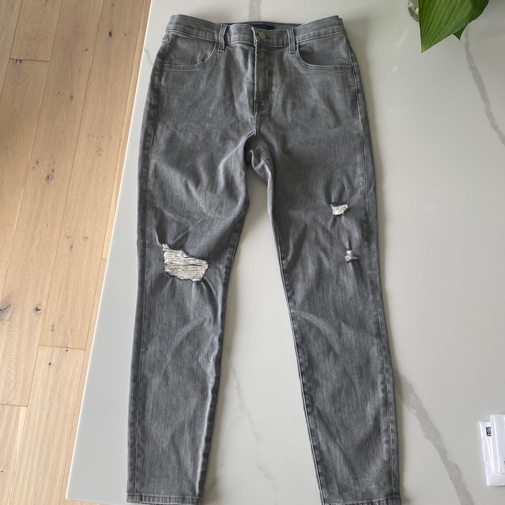 J Brand skinny grey skinny jeans with rips. Never been worn